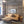 Framed photographic print mockup shown in living space.